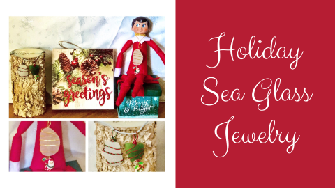 White sea glass wrapped in green and red wire with holiday decals