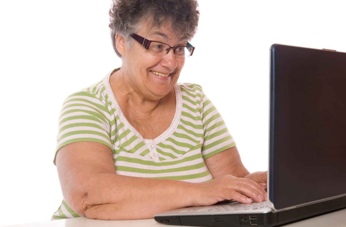 Senior citizen using a computer.